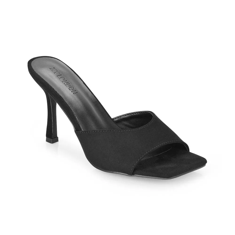 Sia Stiletto High Heeled Slip on Square Toe Mule Sandals in Purple Faux Suede